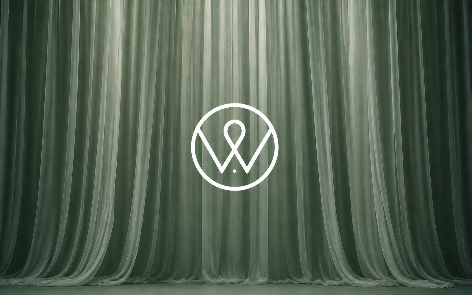 Wedding Aliens — identity mark on draped venue backdrop